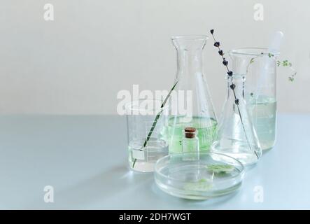 Various bottles on table in laboratory Stock Photo
