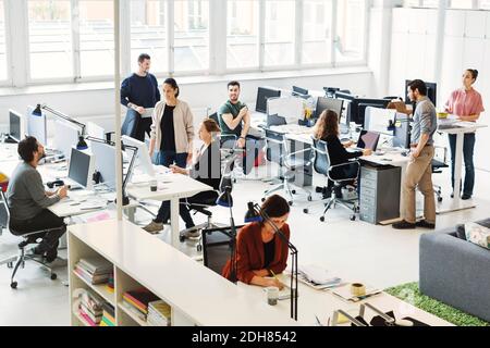 High angle view of business people working in modern office Stock Photo