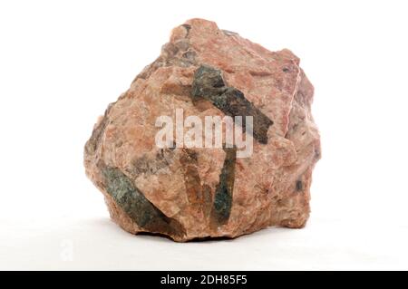 green beryl crystal mineral sample embedded in granite Stock Photo