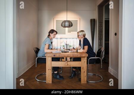 Side view of industrial designers working at home office Stock Photo