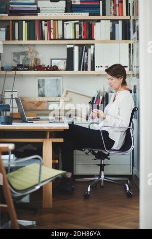 Side view of architect working on product at home office Stock Photo