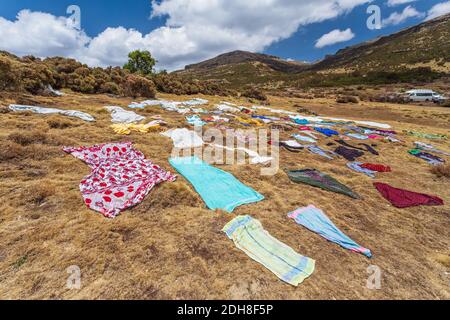 Clothes dry in the sun on ground, Simien Mountain Ethiopia Stock Photo