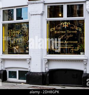 Kingston London, December 09 2020, Tattoo Studio Shop Or Store Window With No People Stock Photo