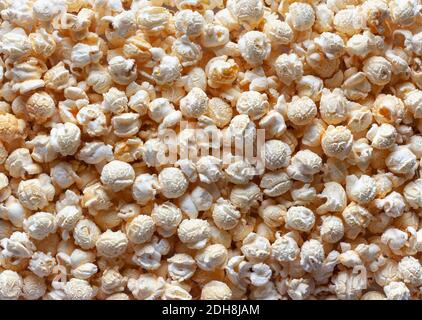 Photo of scattered popcorn texture background. Stock Photo