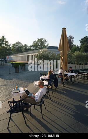 Cafe terrace next to Kurhaus building Kurpark park Wiesbaden city state of Hesse Germany Europe Stock Photo