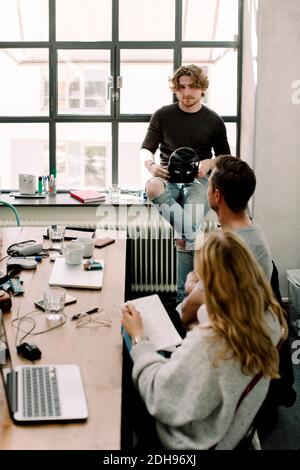 Business people discussing at workplace Stock Photo