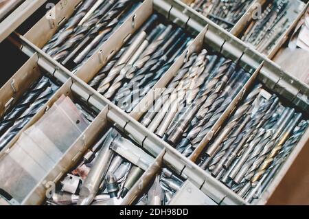 High angle view of drill bits in toolbox Stock Photo