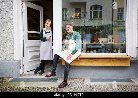 Portrait of confident male and female coworkers at art studio Stock Photo
