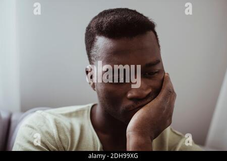 Close-up of worried man at home Stock Photo