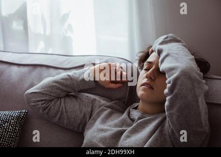 Close-up of woman having headache at home Stock Photo