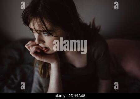High angle view of sad woman looking away Stock Photo