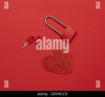 Metal lock with keys and red paper heart Stock Photo