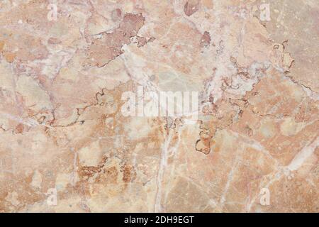 Beige, rough stone texture background with cracks Stock Photo