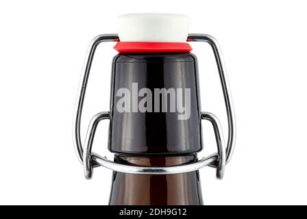A macro shot of the neck of a reusable bottle with a closed ceramic cap, isolated on a white background. Stock Photo