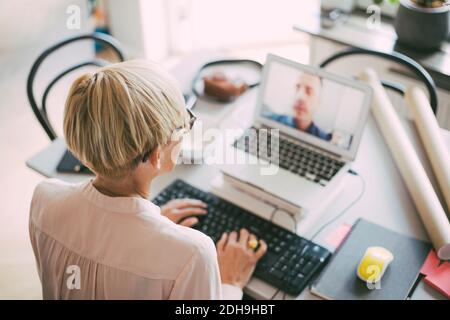 Aerial view of woman working at home having an online meeting Stock Photo