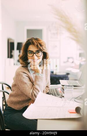 Portrait of architect working at home Stock Photo