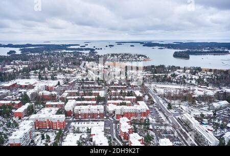 Aerial view of Matinkyla neighborhood of Espoo, Finland. First snow in the city. View of the Baltic Sea. Stock Photo