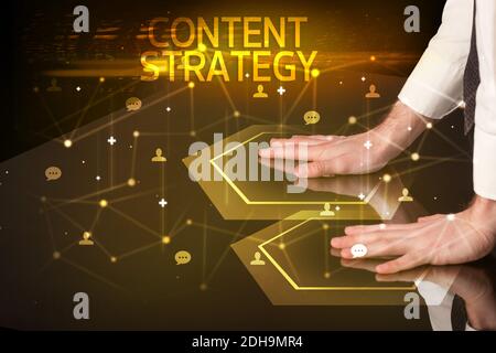 Navigating social networking with CONTENT STRATEGY inscription, new media concept Stock Photo