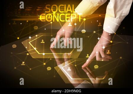 Navigating social networking with SOCIAL CONCEPT inscription, new media concept Stock Photo