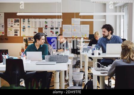 Creative professionals working in office Stock Photo