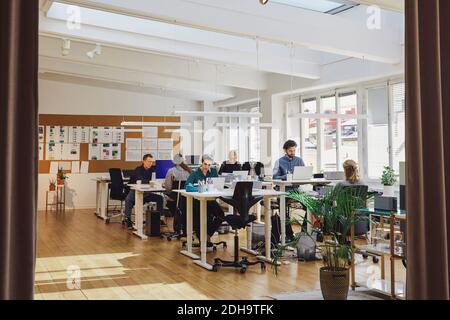 Professionals working in creative office Stock Photo