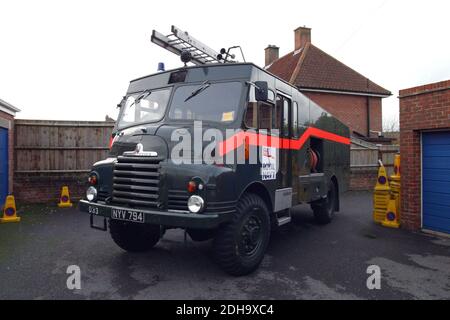 A Royal Navy Green Goddess Fire Appliance is ready to go in to action during the firefighter's strike in November 2002. Pictured near Lymington UK. Stock Photo