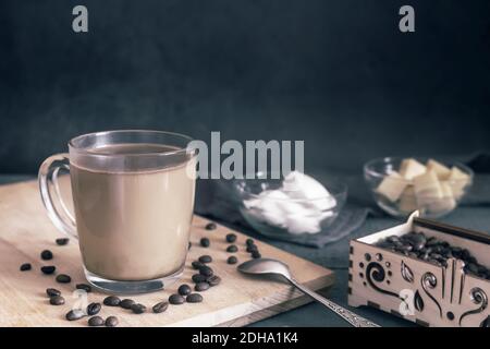 Bulletproof coffee: coffee whipped with cream and coconut oil. Stock Photo