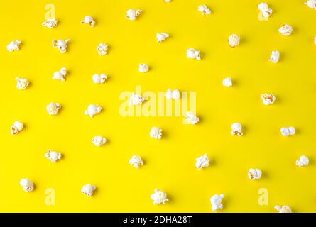 Popcorn pattern on yellow background. Top view Stock Photo