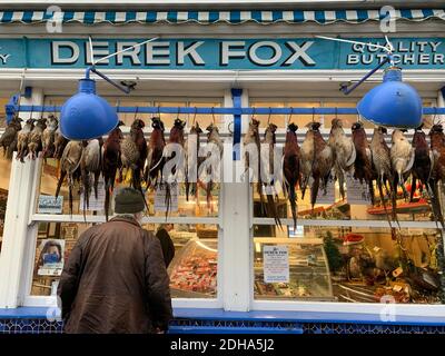 Derek Fox Butchers Shop in Malton North Yorkshire which has a range of game for sale. Stock Photo