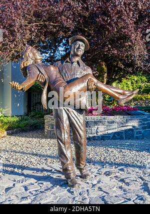 The Quiet Man statue, Cong, County Mayo, Connemara, Republic of Ireland. Eire. The statue is based on the theatrical release poster for the film and s Stock Photo