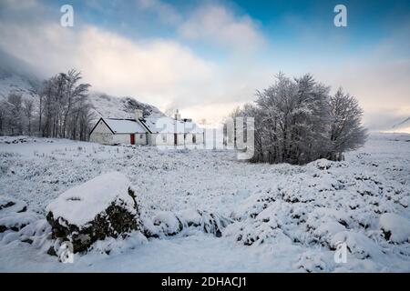 Snow covered winter landscape of Glen Coe at Blackrock cottage  in Scottish Highlands, Scotland, UK Stock Photo