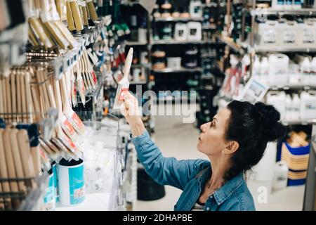 High angle view of senior woman shopping in hardware store Stock Photo