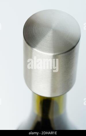 Temporary metal wine bottle stopper clsoe up isolated Stock Photo