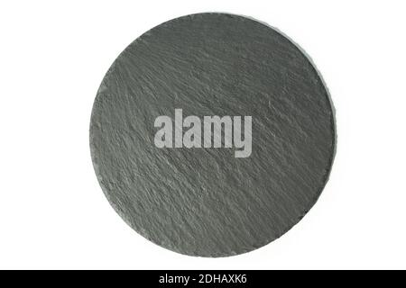 Round black empty slate board isolated on white background. Flat lay top view. Stock Photo