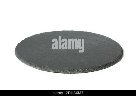 Round black empty slate board isolated on white background. Side view front. Stock Photo