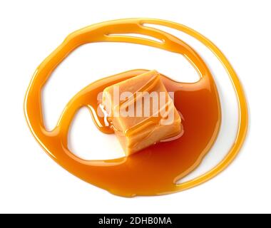 caramel candy and melted caramel sauce isolated on white background Stock Photo