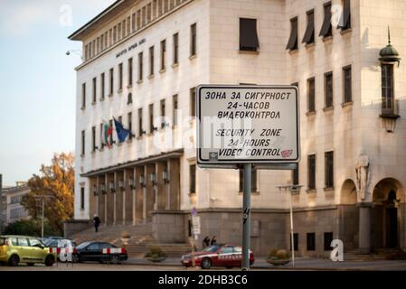 The Bulgarian National Bank building and security zone 24 hours CCTV video control sign on the streets in Sofia Bulgaria Stock Photo