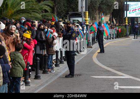 Baku - Azerbaijan: 10 December 2020. Azerbaijan celebrates Nagorno-Karabakh victory. People with Azerbaijani and Turkish flags Stock Photo