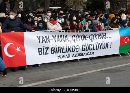 Baku - Azerbaijan: 10 December 2020. Azerbaijan celebrates Nagorno-Karabakh victory. People with Azerbaijani and Turkish flags Stock Photo