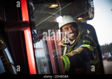 Fire Engine Approach Window fire engine seen through window of engine house door Stock Photo - Alamy