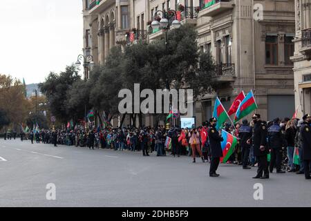 Baku - Azerbaijan: 10 December 2020. Azerbaijan celebrates Nagorno-Karabakh victory. People with Azerbaijani and Turkish flags Stock Photo