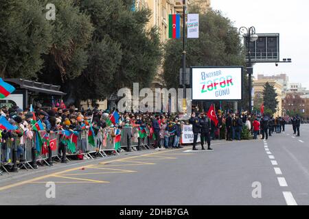 Baku - Azerbaijan: 10 December 2020. Azerbaijan celebrates Nagorno-Karabakh victory. People with Azerbaijani and Turkish flags Stock Photo