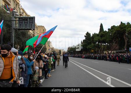 Baku - Azerbaijan: 10 December 2020. Azerbaijan celebrates Nagorno-Karabakh victory. People with Azerbaijani and Turkish flags Stock Photo