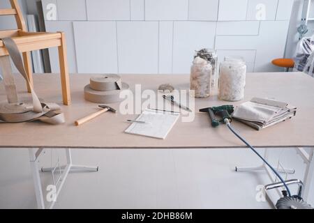 Variety of equipment on desk in design studio Stock Photo