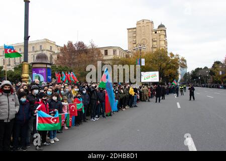 Baku - Azerbaijan: 10 December 2020. Azerbaijan celebrates Nagorno-Karabakh victory. People with Azerbaijani and Turkish flags Stock Photo