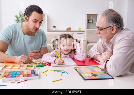 Three generations of family in early development concept Stock Photo