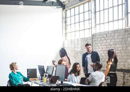 Team of computer hackers working on new IT project at workplace Stock Photo