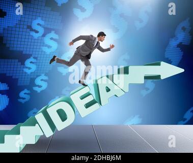 Concept of idea with businessman climbing steps stairs Stock Photo