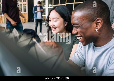 Cheerful multi-ethnic IT professionals planning at creative office Stock Photo