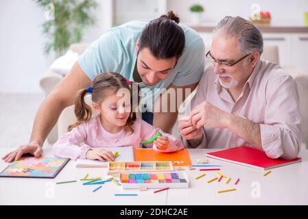 Three generations of family in early development concept Stock Photo